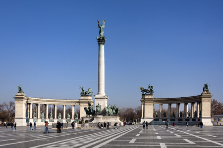 Hungary, Budapest, Hosok tere: Ariel view of famous Heroes' Square in the city center of the Hungarian capital with Archangel Gabriel column, Millennium Monument, colonnade, people. Feb 07, 2019のeditorial素材