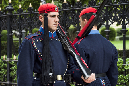 Greece, Athens: Two members of the Presidential Guard soldiers (Evzones or Evzonoi) in the city center of the Greek capital - concept history tradition ceremony elite military. April 30, 2018のeditorial素材