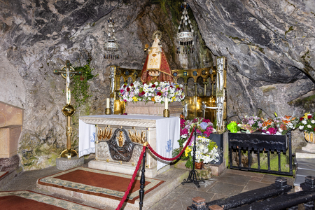 Spain, Asturias, Picos de Europa, Covadonga: Detail of Virgin Mary shrine in the Hermitage of The Holy Cave of Covadonga (Santa Cueva) a famous Spanish sanctuary - concept religion pilgrimage travelの写真素材
