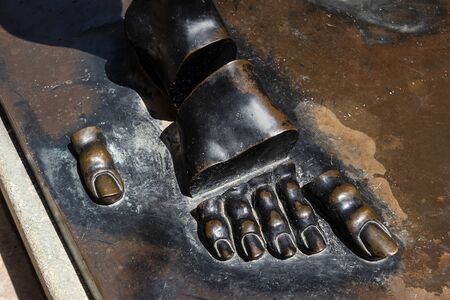 Spain, Catalonia, Figueres: Part of a bronze sculpture next to the Dali Theatre and Museum in the city center of the Catalan hometown of the world famous Spanish artist - concept art. June 27, 2018のeditorial素材