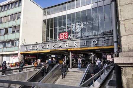 Germany, Bavaria, Munich, Central Station: Street scene with people residents tourists travellers in front of  German train bus taxi station in the city center of Bavarian capital. February 27, 2018のeditorial素材