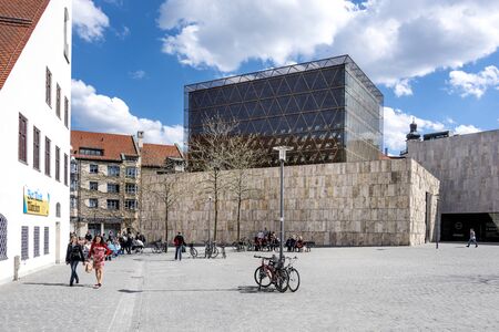 Munich, Germany: Square with building of the Jewish religious community (Kultusgemeinde) with Jewish Museum in the background in the city center of the Bavarian capital. April 29, 2016のeditorial素材