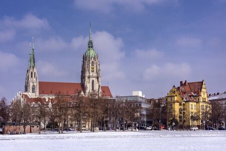Germany, Bavaria, Munich, Theresienwiese: Skyline street scene with panoramic view on famous St. Paul's Church the city center of the Bavarian capital and blue sky in the background. February 27, 2018のeditorial素材