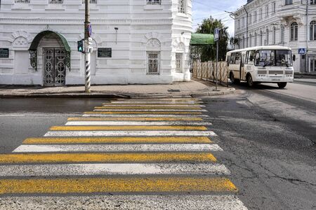 Russia, Golden Ring, Kostroma, Susanin Square: Street scene with crosswalk, corner, public minbus (Marshrutka), traffic signs in the city center of the Russian town - transport travel. Jul 05, 2019のeditorial素材