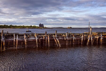 Russia, Karelia, White Sea, near Kem: Coastline scene and rural remote natural place with calm ocean...