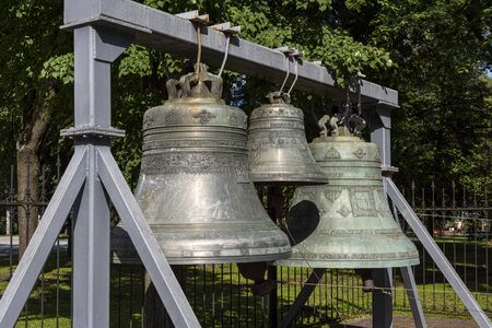 Russia, Golden Ring, Yaroslavl: Three historic old bronze bells of famous Virgin Mary Ascension Church Cathedral (Maria-Entschlafens-Kathedrale) in the city center of the Russian town. Jul 06, 2019のeditorial素材
