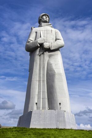 Russia, Murmansk, Barents Sea: Panorama of famous Alyosha Monument to Soviet soldiers, sailors and airmen of World War II (the Great Patriotic War) near city center with blue sky. July 15, 2019のeditorial素材