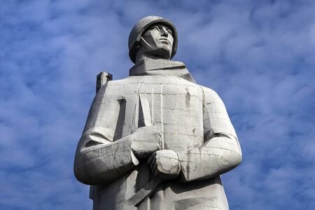 Russia, Murmansk, Barents Sea: Detail torso of famous Alyosha Monument to Soviet soldiers, sailors and airmen of World War II (the Great Patriotic War) near city center with blue sky. July 19, 2019のeditorial素材