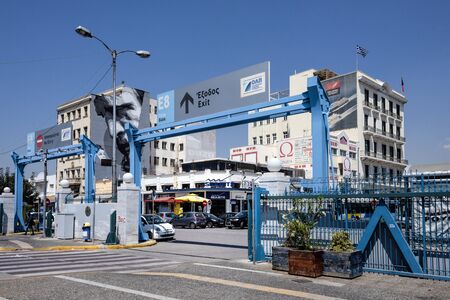Greece, Athens, Piraeus: Street scene with Gate 8 at the famous port harbor in the south of the city center of the Greek capital - concept sea traffic transport operator seaway. April 27, 2018のeditorial素材