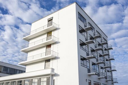Germany, Saxony-Anhalt, Dessau-Rosslau: Exterior view of famous Bauhaus building with front facade and blue sky - concept modern architecture heritage art school architect Walter Gropius. Dec 30, 2019のeditorial素材