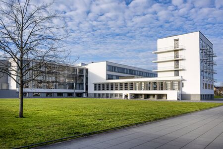 Germany, Saxony-Anhalt, Dessau-Rosslau: Exterior view of famous Bauhaus building with front facade and blue sky - concept modern architecture heritage art school architect Walter Gropius. Dec 30, 2019のeditorial素材