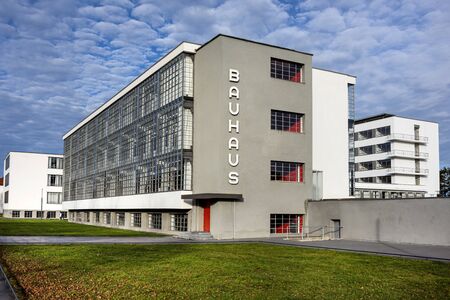 Germany, Saxony-Anhalt, Dessau-Rosslau: Exterior view of famous Bauhaus building with front facade and blue sky - concept modern architecture heritage art school architect Walter Gropius. Dec 30, 2019のeditorial素材