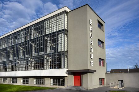 Germany, Saxony-Anhalt, Dessau-Rosslau: Exterior view of famous Bauhaus building with front facade and blue sky - concept modern architecture heritage art school architect Walter Gropius. Dec 30, 2019のeditorial素材