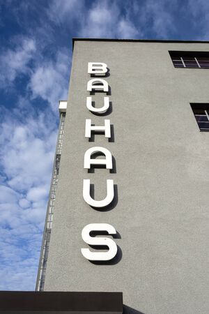 Germany, Saxony-Anhalt, Dessau-Rosslau: Exterior view of famous Bauhaus building with front facade and blue sky - concept modern architecture heritage art school architect Walter Gropius. Dec 30, 2019のeditorial素材
