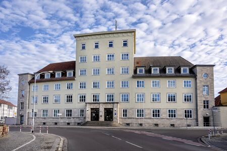 Germany, Saxony-Anhalt, Dessau-Rosslau: Street scene with Police station house building and blue cloudy sky in the city center of the German town - concept safety help security crime. Dec 30, 2019のeditorial素材