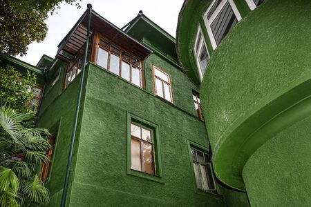 Russia, Sochi: Courtyard of Joseph Stalin's dacha villa cottage near the city center of the famous Russian town with green facade, garden - travel history museum summer residence. Jun 27, 2019のeditorial素材