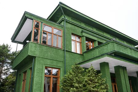 Russia, Sochi: Courtyard of Joseph Stalin's dacha villa cottage near the city center of the famous Russian town with green facade, garden - travel history museum summer residence. Jun 27, 2019のeditorial素材