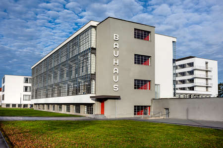 Germany, Saxony-Anhalt, Dessau-Rosslau: Exterior view of famous Bauhaus building with front facade and blue sky - concept modern architecture heritage art school architect Walter Gropius. Dec 30, 2019のeditorial素材