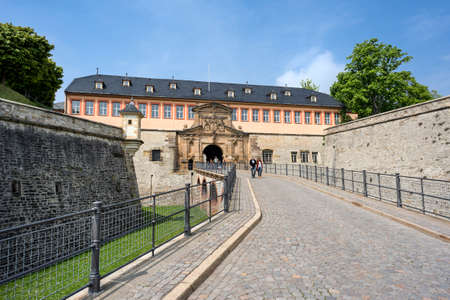 Germany, Thuringia, Erfurt, Zitadelle Petersberg, near dome, Petrini Street, Peterstor: Gate and main entrance of famous citadel in the city center of the German town with blue sky. 07 May 2017のeditorial素材