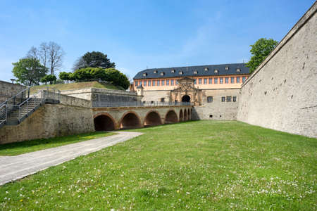 Germany, Thuringia, Erfurt, Zitadelle Petersberg, near dome, Petrini Street, Peterstor - May 07: Side view with green grass of gate and main entrance of citadel, 07 May 2017のeditorial素材