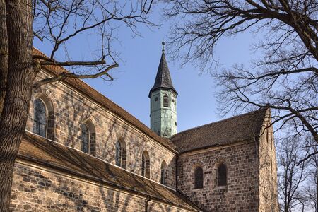 Germany, Brandenburg, Jueterbog: Steeple of Zinna Abbey church (Kloster Zinna) in the center of the German town. The abbey is a former Cistercian monastery, about 60 km (37 miles) south of Berlin.の写真素材