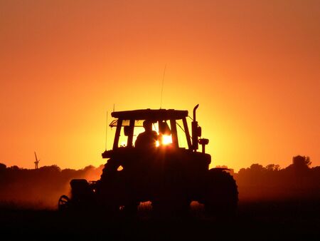 Tractor sunsetの写真素材