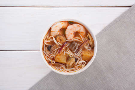 Thai Asian soup with seafood and egg noodles