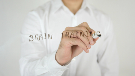 Brain Training, Written on Glass by Man in Studioの写真素材