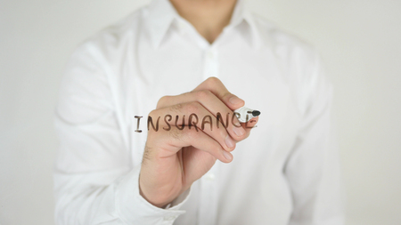 Insurance, Written on Glass by Man in Studioの写真素材
