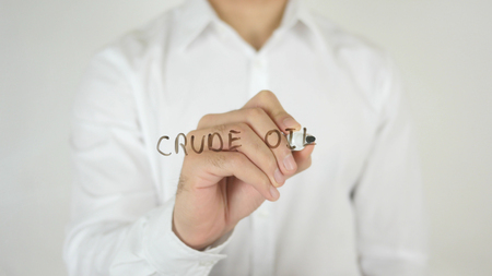 Crude Oil, Written on Glass by Man in Studioの写真素材