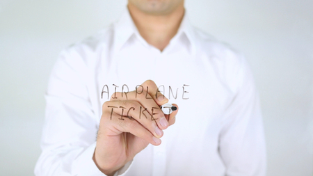 Airplane Ticket, Man Writing on Glass, Handwrittenの写真素材