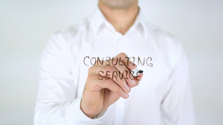 Consulting Service, Man Writing on Glass, Handwrittenの写真素材