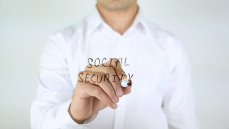 Social Security, Man Writing on Glassの写真素材