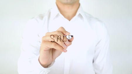 Sale, Man Writing on Glassの写真素材