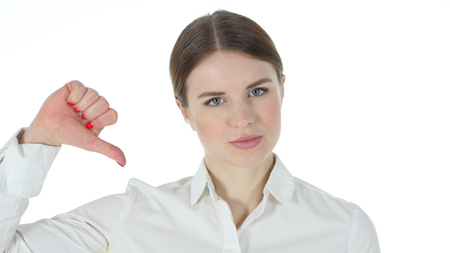 Thumbs Down by Businesswoman isolated on white background