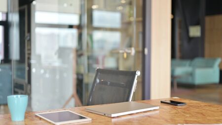 Creative Office with Laptop on Table