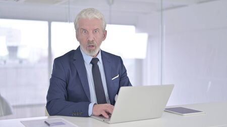 Attractive Old Businessman saying No by Head Shakingの写真素材