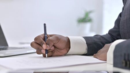Writing on Paper at Work, Close up