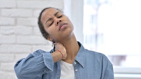 Young African Woman with Neck Painの写真素材