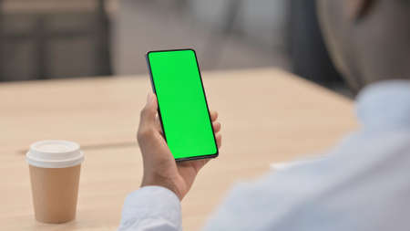 African Businessman using Smartphone with Chroma Screen
