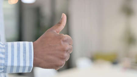 Close up of African Man Showing Thumbs Up Gestureの写真素材