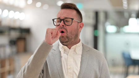 Portrait of Sick Caucasian Young man Coughing