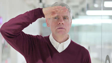 Curious Middle Aged Businessman Searching New Opportunity