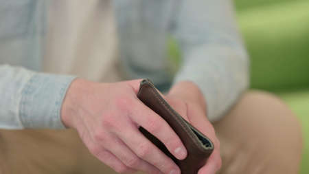 Close up of Hands Holding Purse