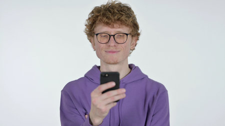 Redhead Man Using Smartphone, White Background