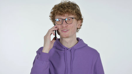 Redhead Man Talking on Phone, White Background