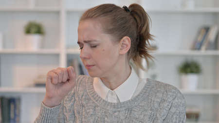 Sick Woman Coughing, Feeling Unwellの写真素材