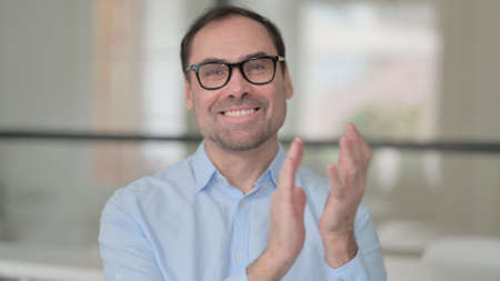 Portrait Shot of Happy Middle Aged Man Clapping, Applauding
