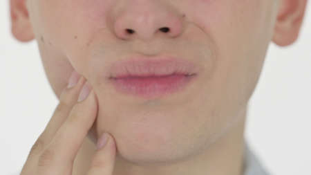 Close up of Mouth With Toothache on White Backgroundの写真素材