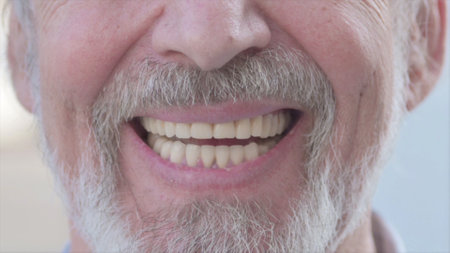 Close Up of Smiling Old Man Lips Outdoor